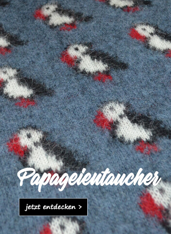 Strickwaren mit Papageientaucher-Motiv